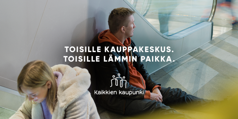 Kuvassa kaksi nuorta kauppakeskuksessa ja teksti "Toisille kauppakeskus. Toisille lämmin paikka." Kaikkien kaupunki